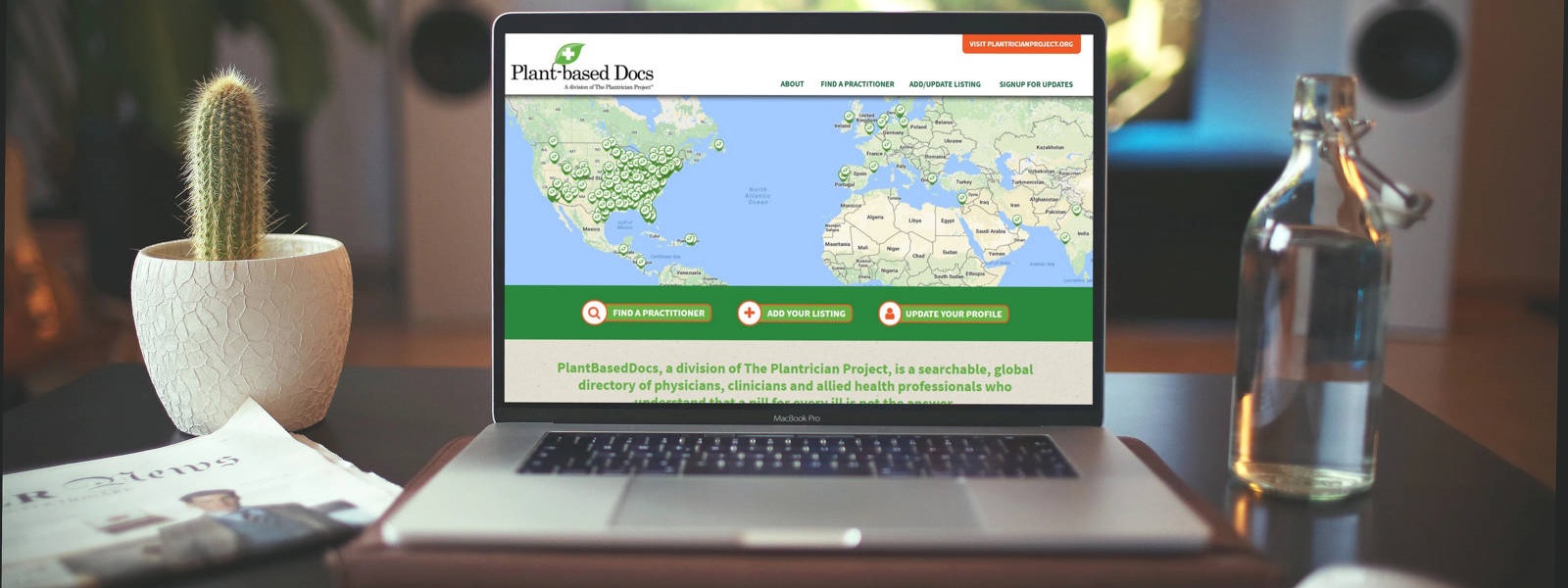 Laptop screen showcasing Plant-Based Docs Directory Directory website